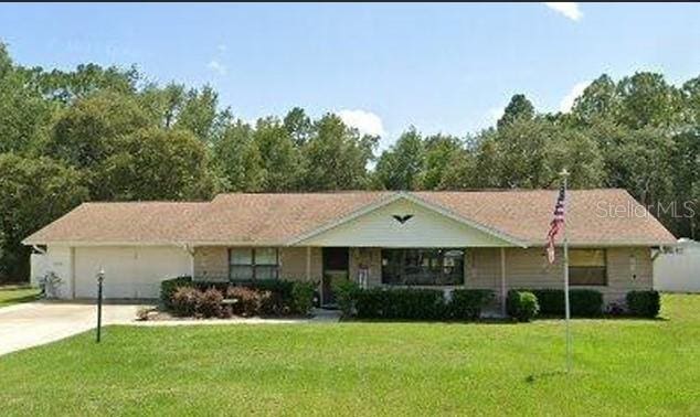 single story home with a front yard