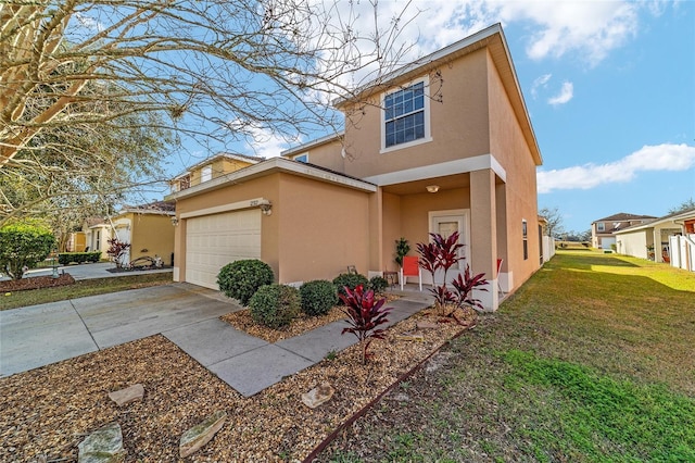 view of front of home featuring a garage and a front lawn