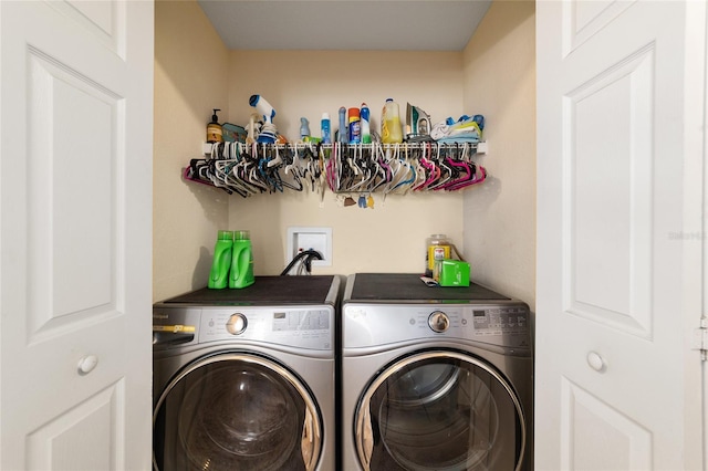 laundry room with washer and dryer