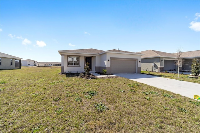 view of front of house featuring a garage and a front yard