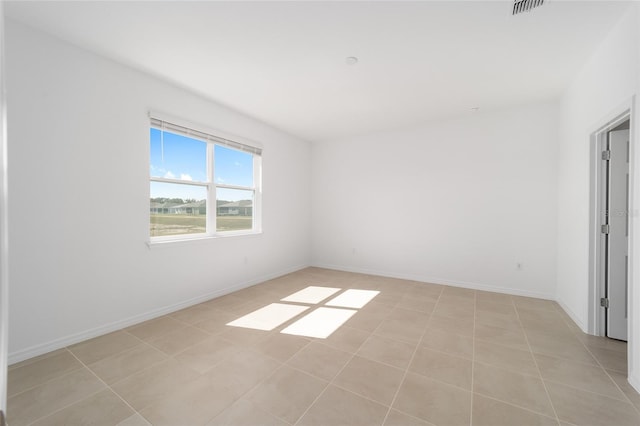 view of tiled spare room