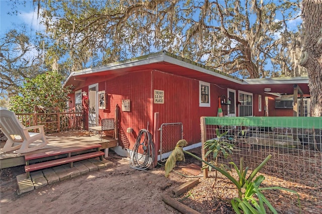 view of home's exterior with a deck