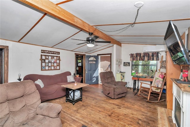 living room featuring vaulted ceiling with beams, wood-type flooring, a ceiling fan, and a wall mounted AC