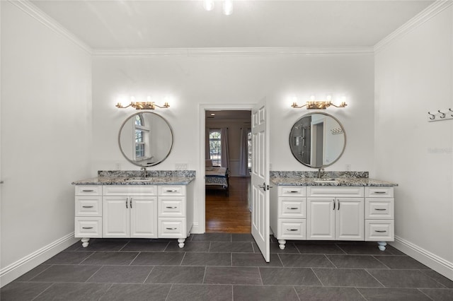 bathroom featuring vanity and crown molding