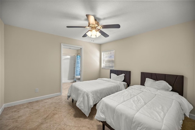 bedroom featuring light tile patterned flooring, ensuite bathroom, and ceiling fan