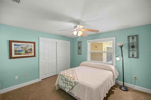 bedroom with carpet flooring, ceiling fan, and a closet