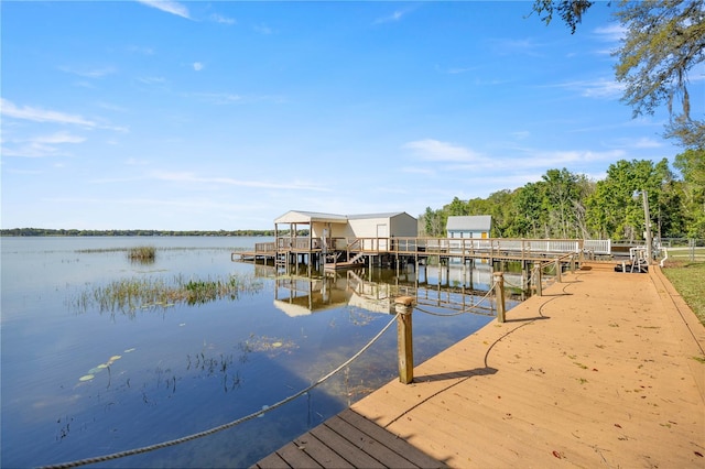 view of dock with a water view