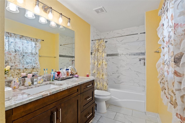 full bathroom with shower / tub combo with curtain, vanity, and toilet