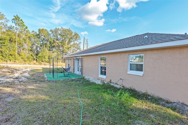 exterior space with a gazebo and a yard