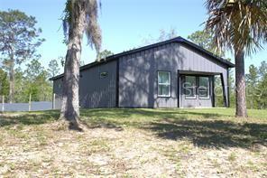 exterior space with a yard