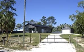 view of front of house with a front lawn