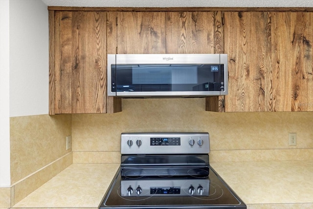 kitchen with appliances with stainless steel finishes