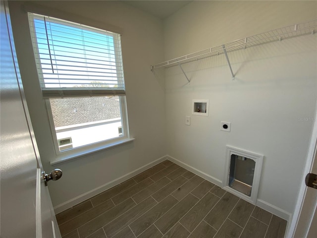 clothes washing area with hookup for a washing machine and hookup for an electric dryer