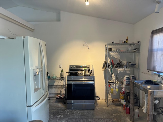 kitchen featuring electric range and white fridge with ice dispenser