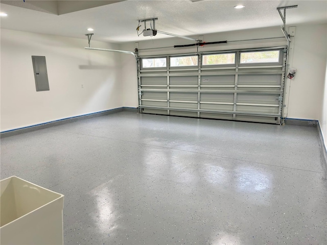 garage with baseboards, electric panel, and a garage door opener