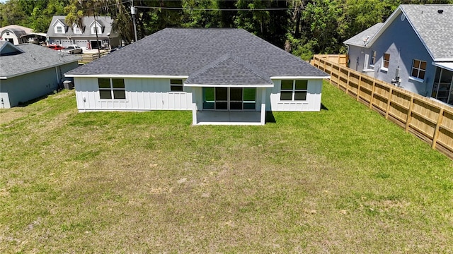 3684 SE 130th Pl, Belleview, FL 34420 - back of property featuring a shingled roof