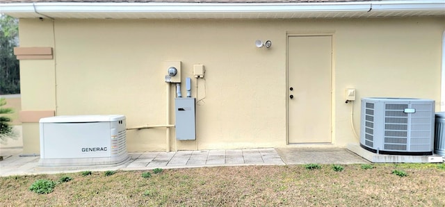 entrance to property with central AC unit