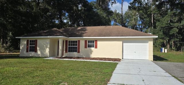 ranch-style house featuring a garage and a front lawn