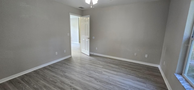 empty room featuring dark hardwood / wood-style floors