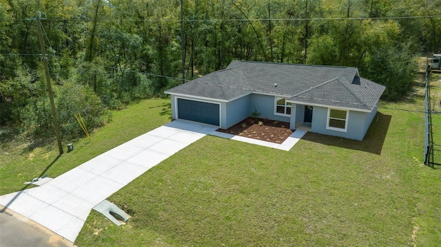 ranch-style home with a front lawn, a garage, roof with shingles, and stucco siding