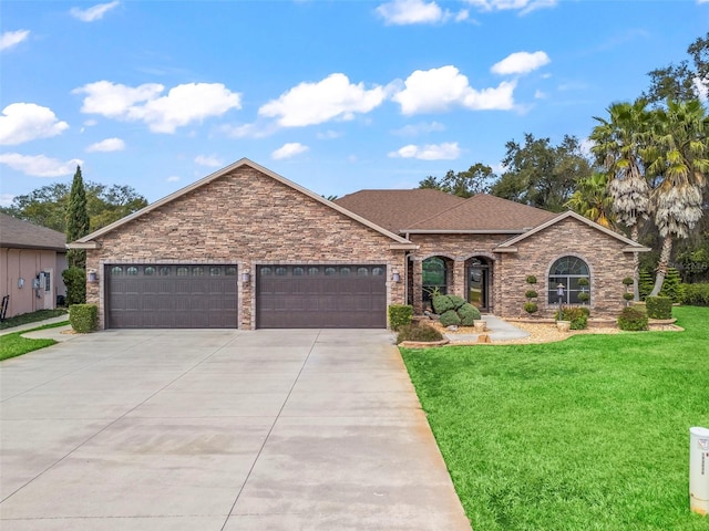 ranch-style house with a garage and a front lawn