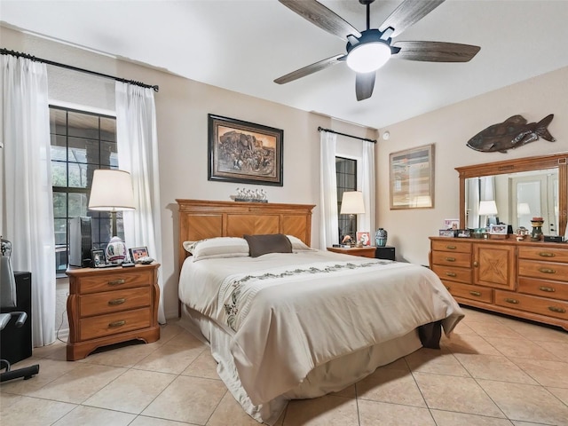 bedroom featuring ceiling fan and light tile patterned flooring