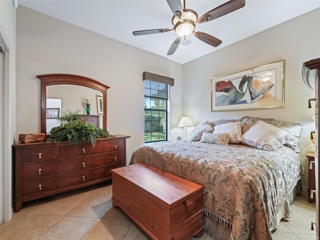 bedroom with light tile patterned flooring and ceiling fan