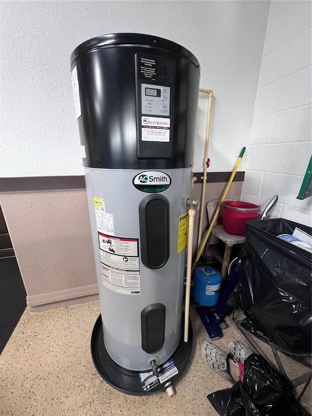 utility room with water heater