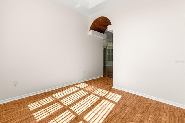 spare room featuring light hardwood / wood-style flooring