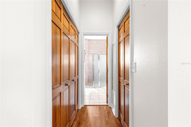 hallway featuring hardwood / wood-style flooring