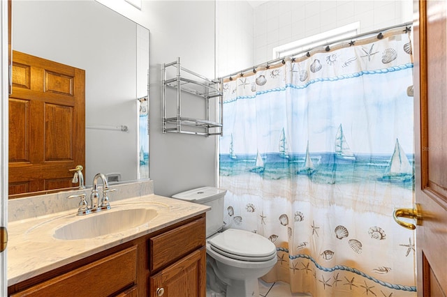 bathroom featuring vanity, curtained shower, and toilet