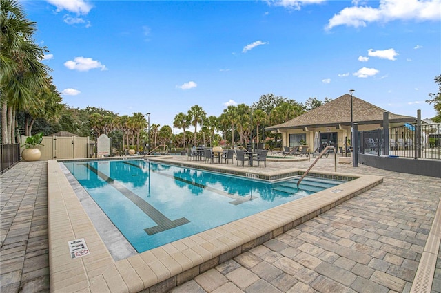 view of pool featuring a patio