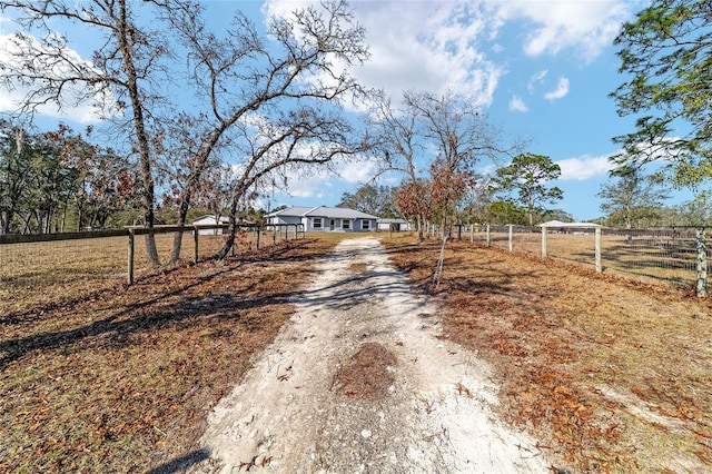 view of street featuring a rural view