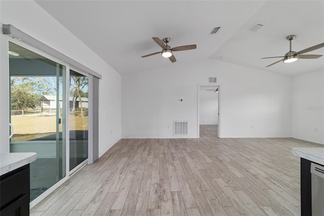 unfurnished living room featuring light hardwood / wood-style flooring, ceiling fan, and vaulted ceiling