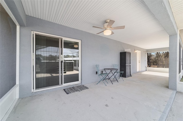 view of patio featuring ceiling fan