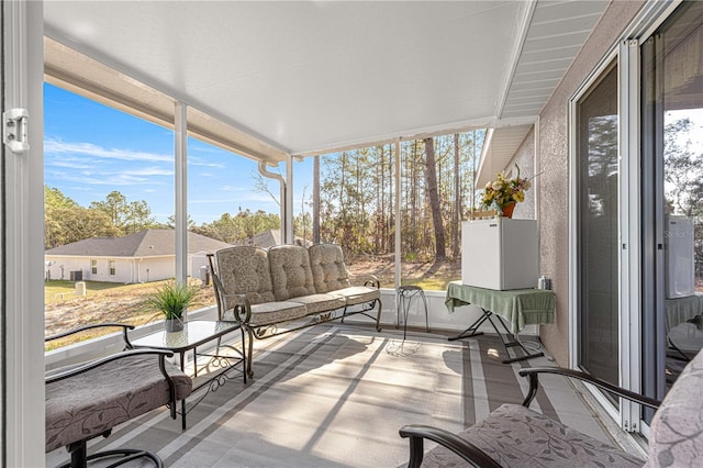 sunroom with plenty of natural light