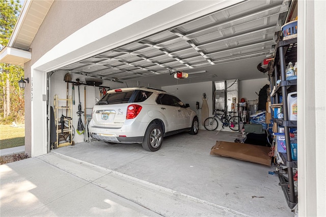 garage featuring a garage door opener