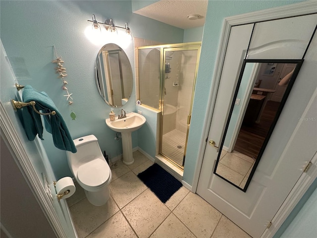 130 Harbour Cove Way, Clermont, FL 34711 - bathroom with a stall shower, toilet, and baseboards