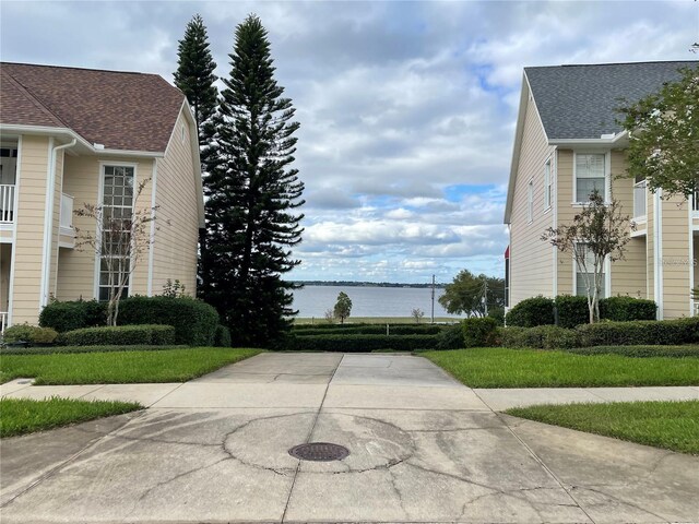 130 Harbour Cove Way, Clermont, FL 34711 - view of community featuring a water view
