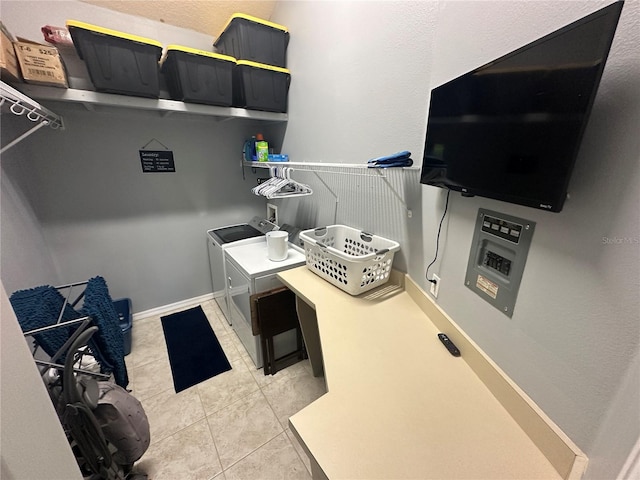 130 Harbour Cove Way, Clermont, FL 34711 - laundry room featuring separate washer and dryer, light tile patterned floors, and electric panel