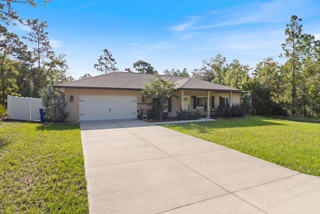 ranch-style home featuring a garage, a front yard, and covered porch