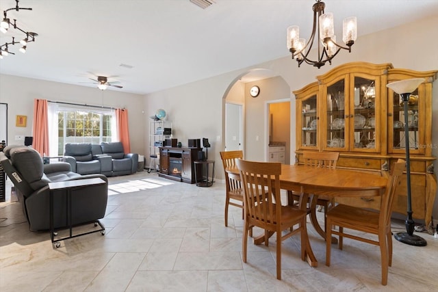 dining space featuring ceiling fan