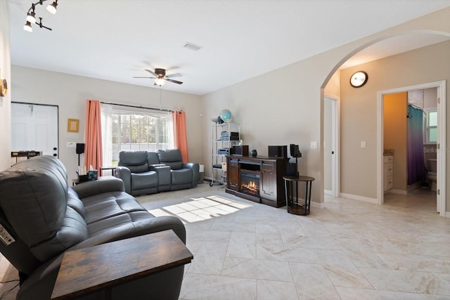 living room with ceiling fan