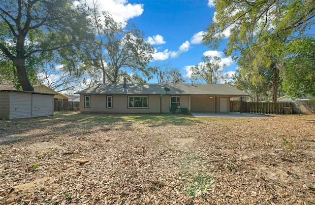 rear view of property with a patio