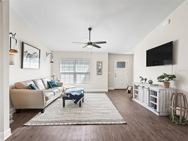 living room featuring ceiling fan, lofted ceiling, and dark hardwood / wood-style floors