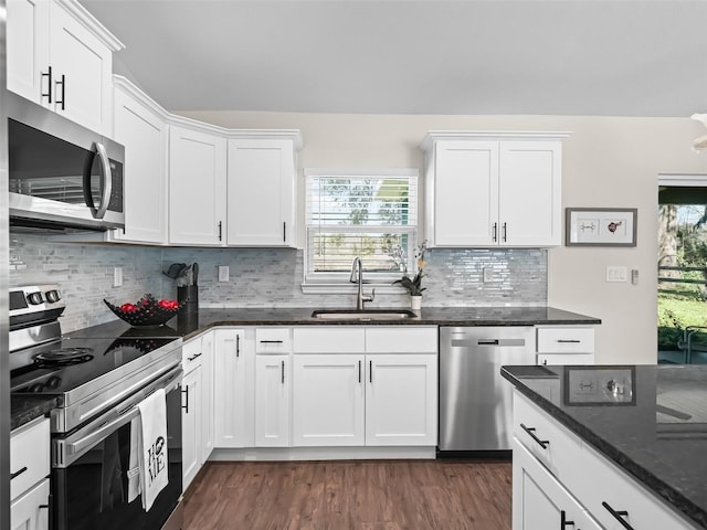 kitchen featuring white cabinetry, sink, and stainless steel appliances