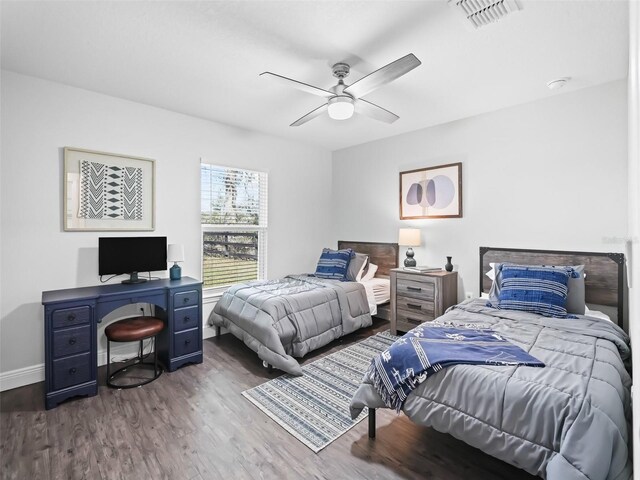 14605 SW 20th Pl, Ocala, FL 34481 - bedroom with baseboards, ceiling fan, visible vents, and wood finished floors