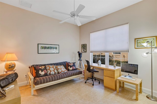 tiled office space with ceiling fan