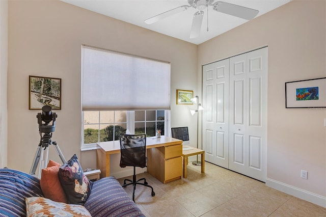 office space with light tile patterned flooring and ceiling fan