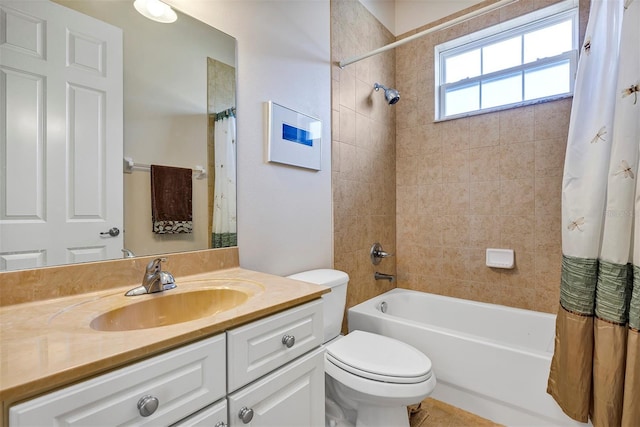 full bathroom featuring shower / bath combination with curtain, vanity, and toilet